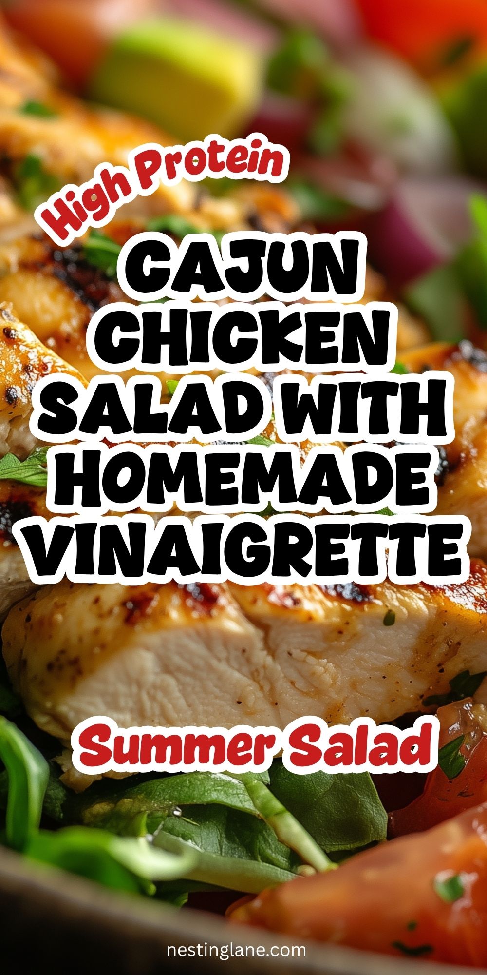Pinterest pin for Cajun chicken salad with grilled sliced chicken over mixed greens, tomatoes, avocado, and red onion. Overlaid text says “High Protein CAJUN CHICKEN SALAD WITH HOMEMADE VINAIGRETTE” and “Summer Salad.” Small text at bottom reads “nestinglane.com”.