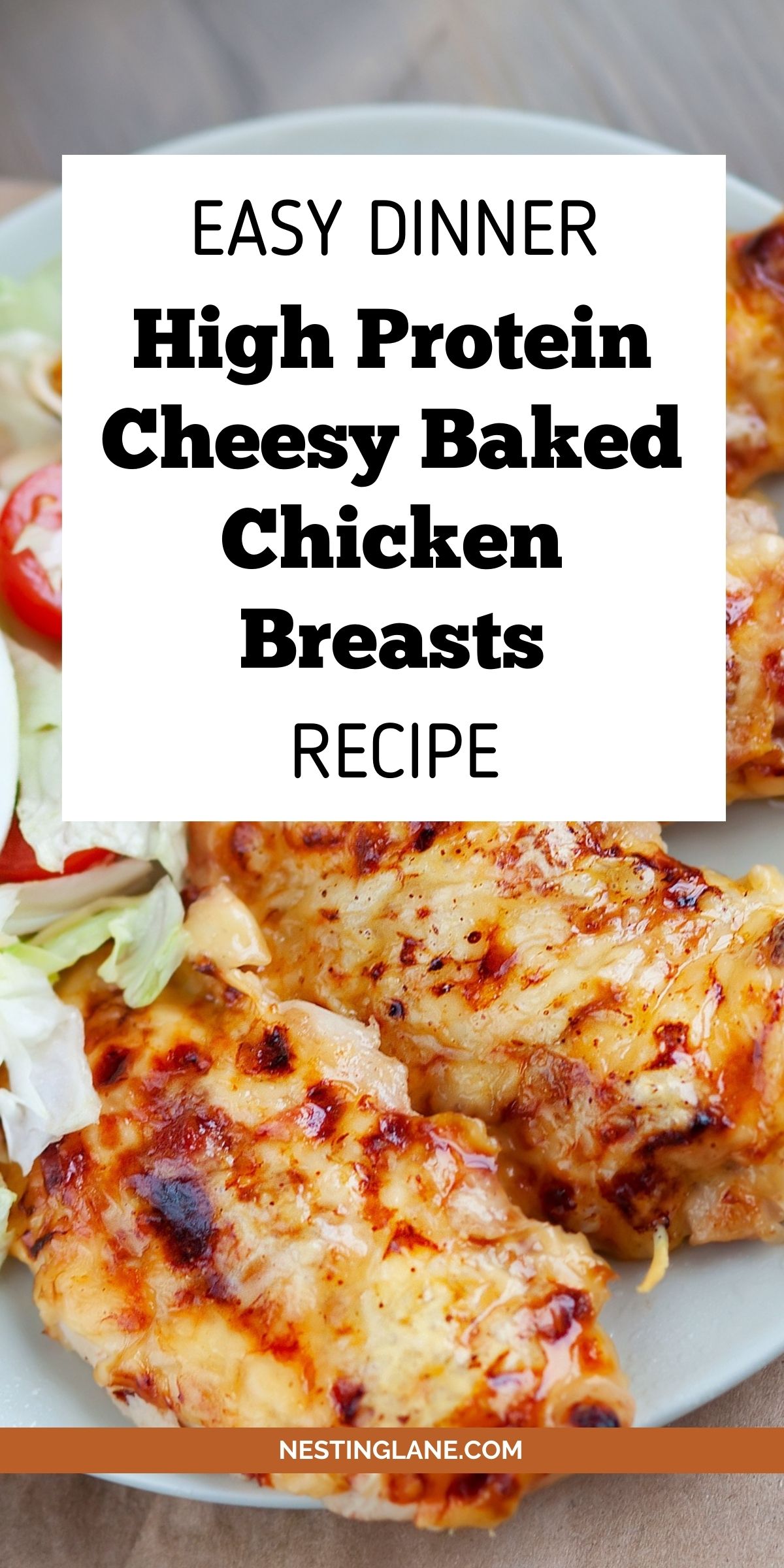 Plate of cheesy baked chicken breasts with browned melted cheese, served with a simple side salad. Overlay text reads “EASY DINNER High Protein Cheesy Baked Chicken Breasts RECIPE.” Bottom text says “NESTINGLANE.COM”.