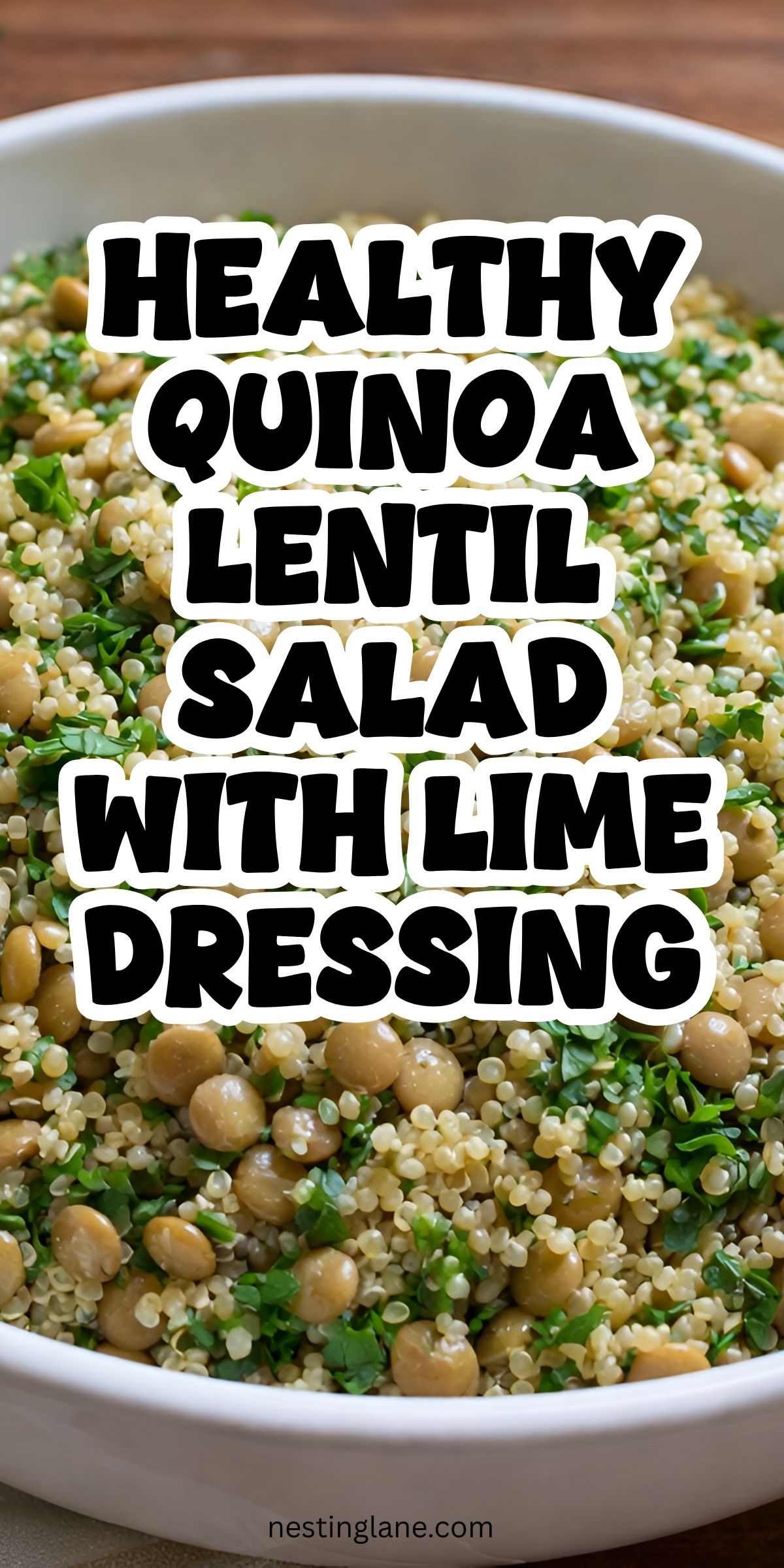 Close-up of a white bowl filled with healthy quinoa lentil salad, with fluffy quinoa, lentils, and chopped fresh herbs on a wood table. Bold text overlay reads: “HEALTHY QUINOA LENTIL SALAD WITH LIME DRESSING.” Small text at the bottom says “nestinglane.com.”