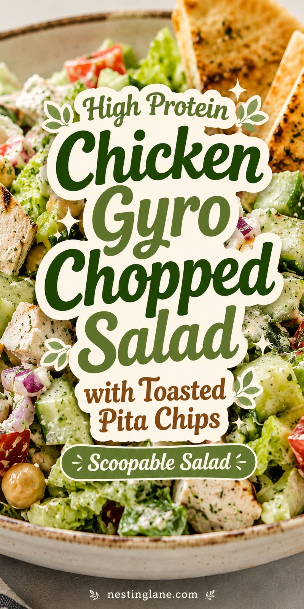 Chicken gyro chopped salad with romaine, chicken, cucumber, tomatoes, chickpeas, feta, creamy dressing, and toasted pita chips. Text reads “High Protein Chicken Gyro Chopped Salad with Toasted Pita Chips. Scoopable Salad. nestinglane.com”