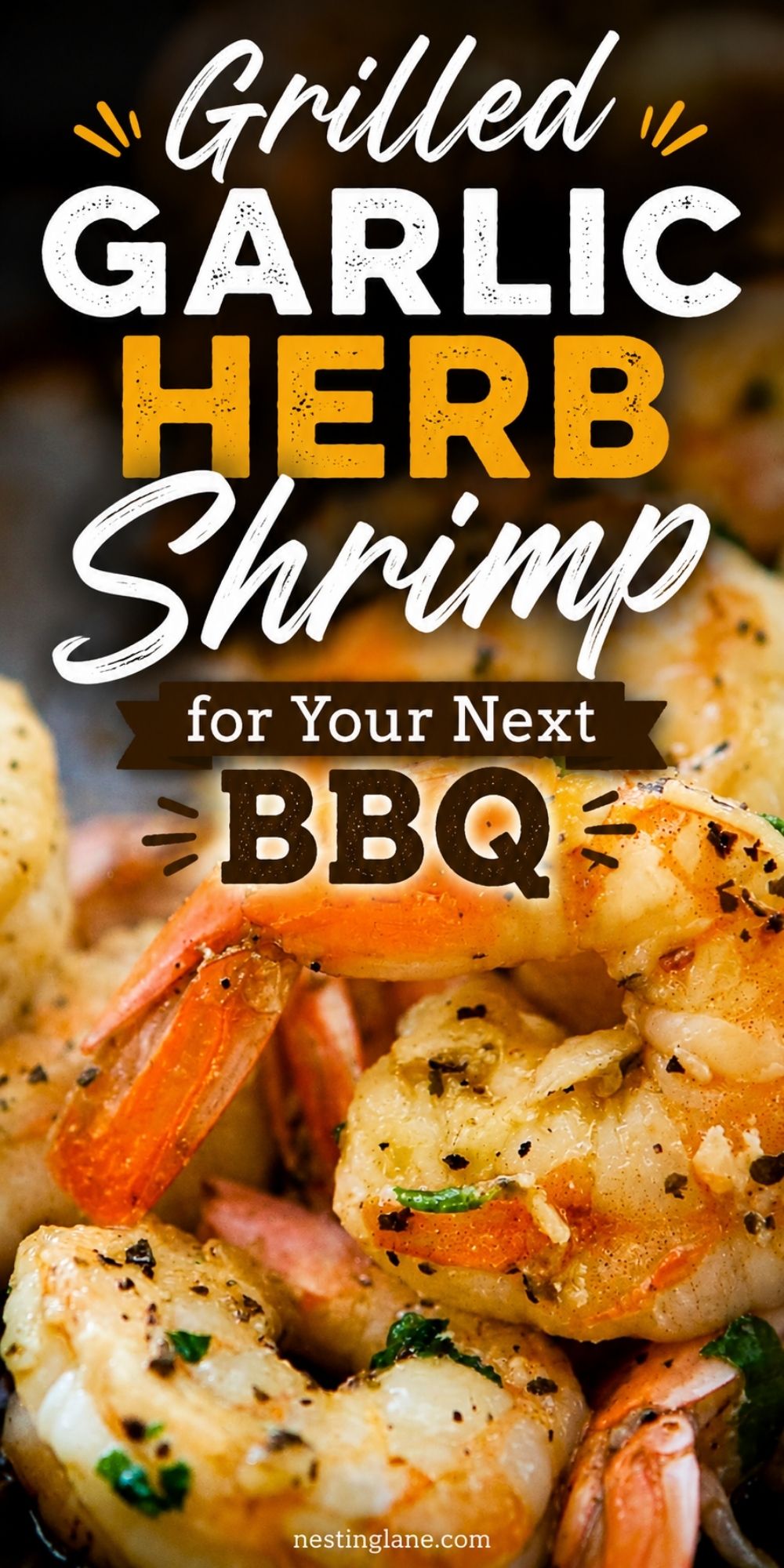 Grilled garlic herb shrimp with orange tails, black pepper, and fresh herbs in a close-up food photo. Text reads “Grilled Garlic Herb Shrimp for Your Next BBQ” with “nestinglane.com” at the bottom.