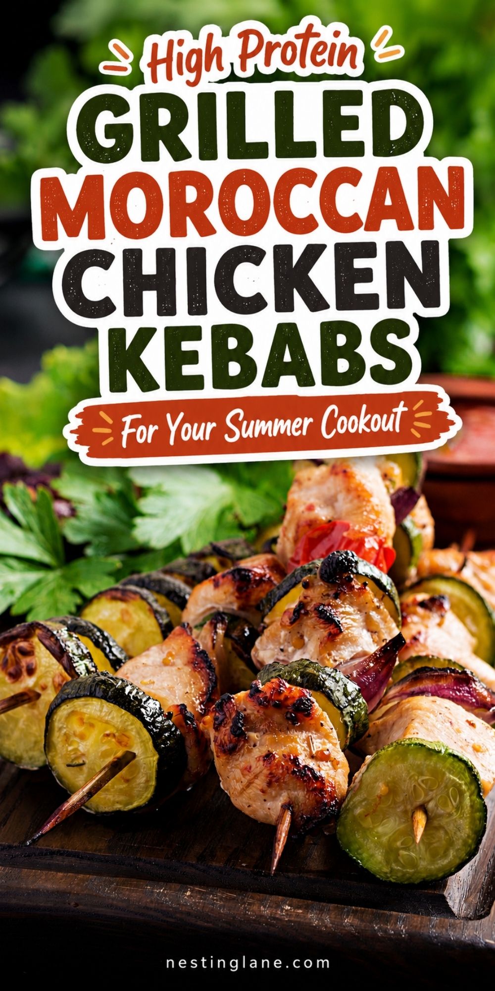 High protein grilled Moroccan chicken kebabs with zucchini and red onion on a wooden board. Text reads “High Protein Grilled Moroccan Chicken Kebabs For Your Summer Cookout” and “nestinglane.com.”