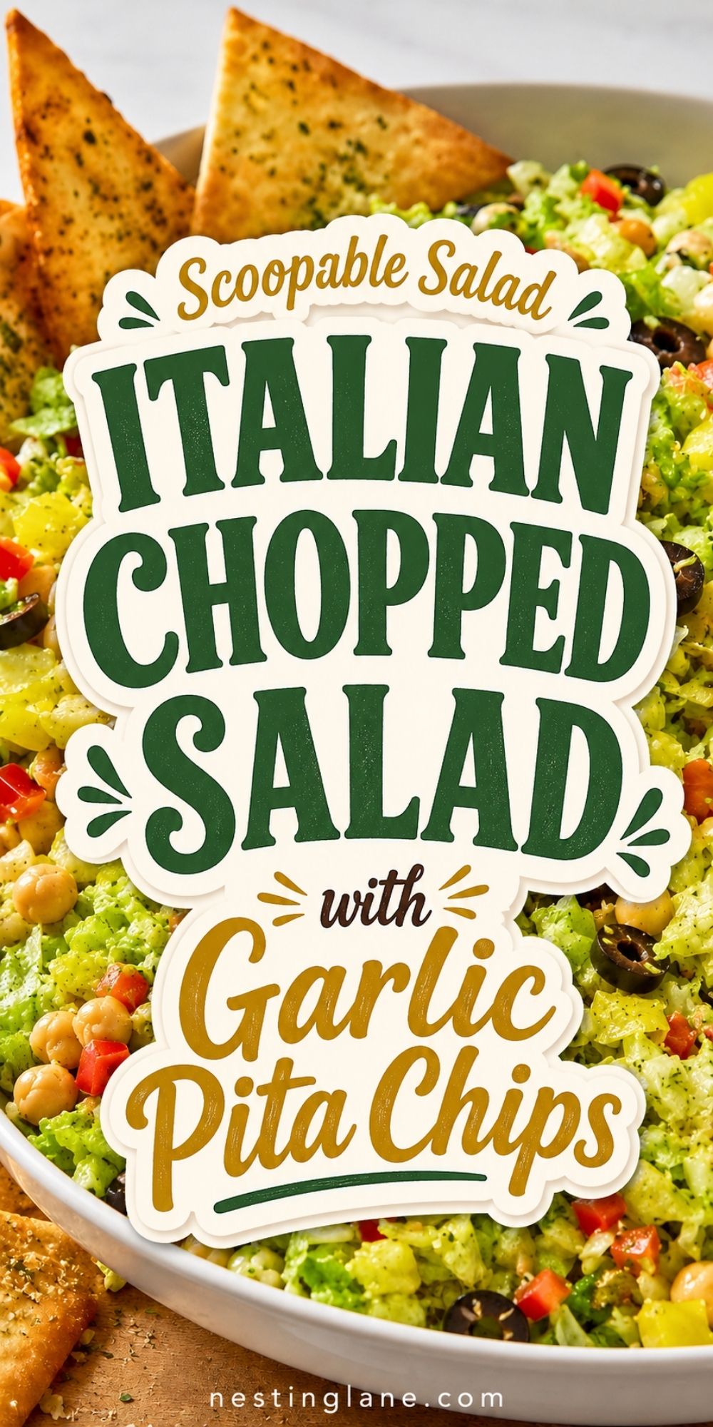 Scoopable salad pin with Italian chopped salad, garlic pita chips, lettuce, chickpeas, black olives, banana peppers, and red bell pepper. Text reads “Scoopable Salad Italian Chopped Salad with Garlic Pita Chips” and “nestinglane.com.”