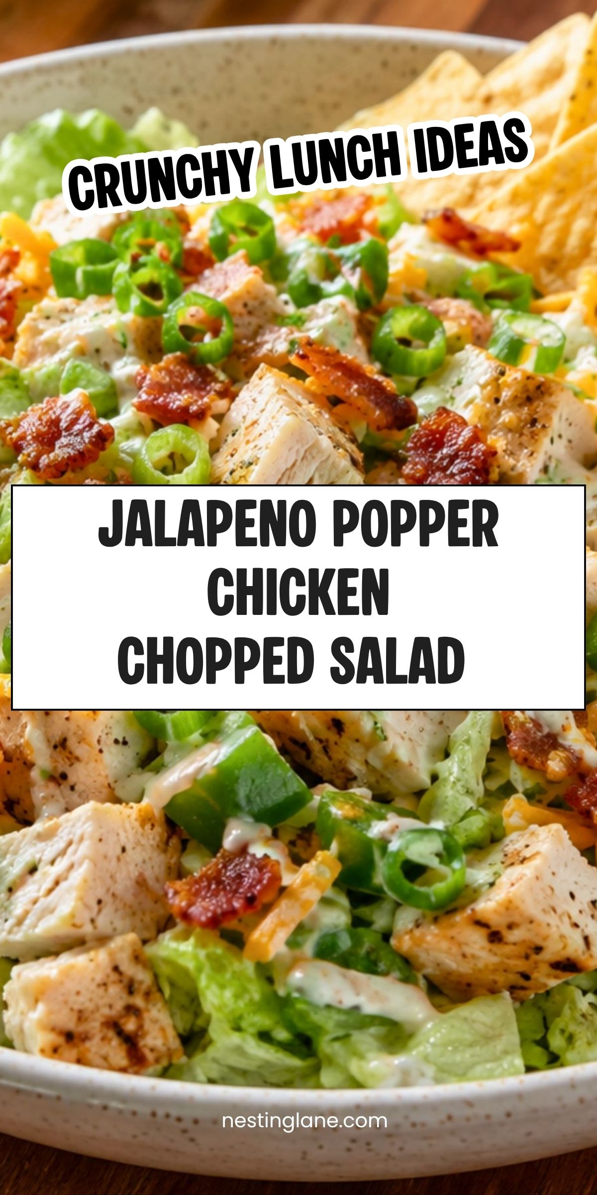 JalapeƱo popper chicken chopped salad with grilled chicken, lettuce, jalapeƱos, bacon, cheese, creamy dressing, and tortilla chips. Text reads: āCrunchy Lunch Ideas. JalapeƱo Popper Chicken Chopped Salad. nestinglane.comā