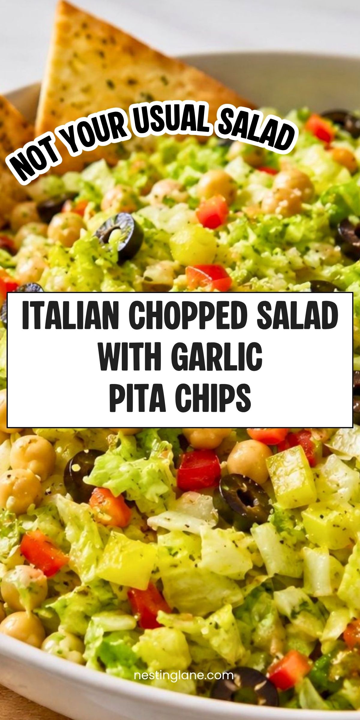 Italian chopped salad with lettuce, chickpeas, black olives, red bell pepper, creamy dressing, and garlic pita chips. Text reads: āNot Your Usual Salad. Italian Chopped Salad with Garlic Pita Chips. nestinglane.comā
