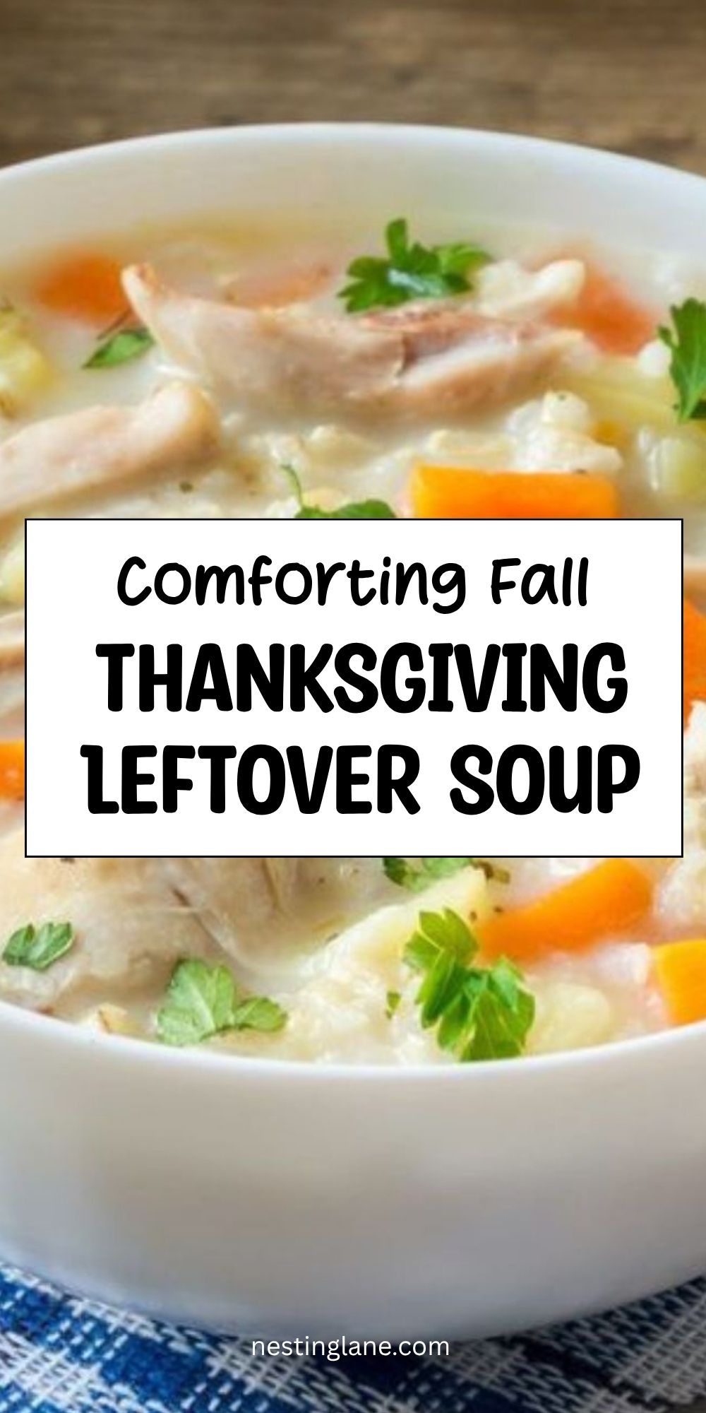 Creamy Thanksgiving leftover soup with turkey, carrots, vegetables, and parsley in a white bowl. Text reads “Comforting Fall Thanksgiving Leftover Soup” and “nestinglane.com.”