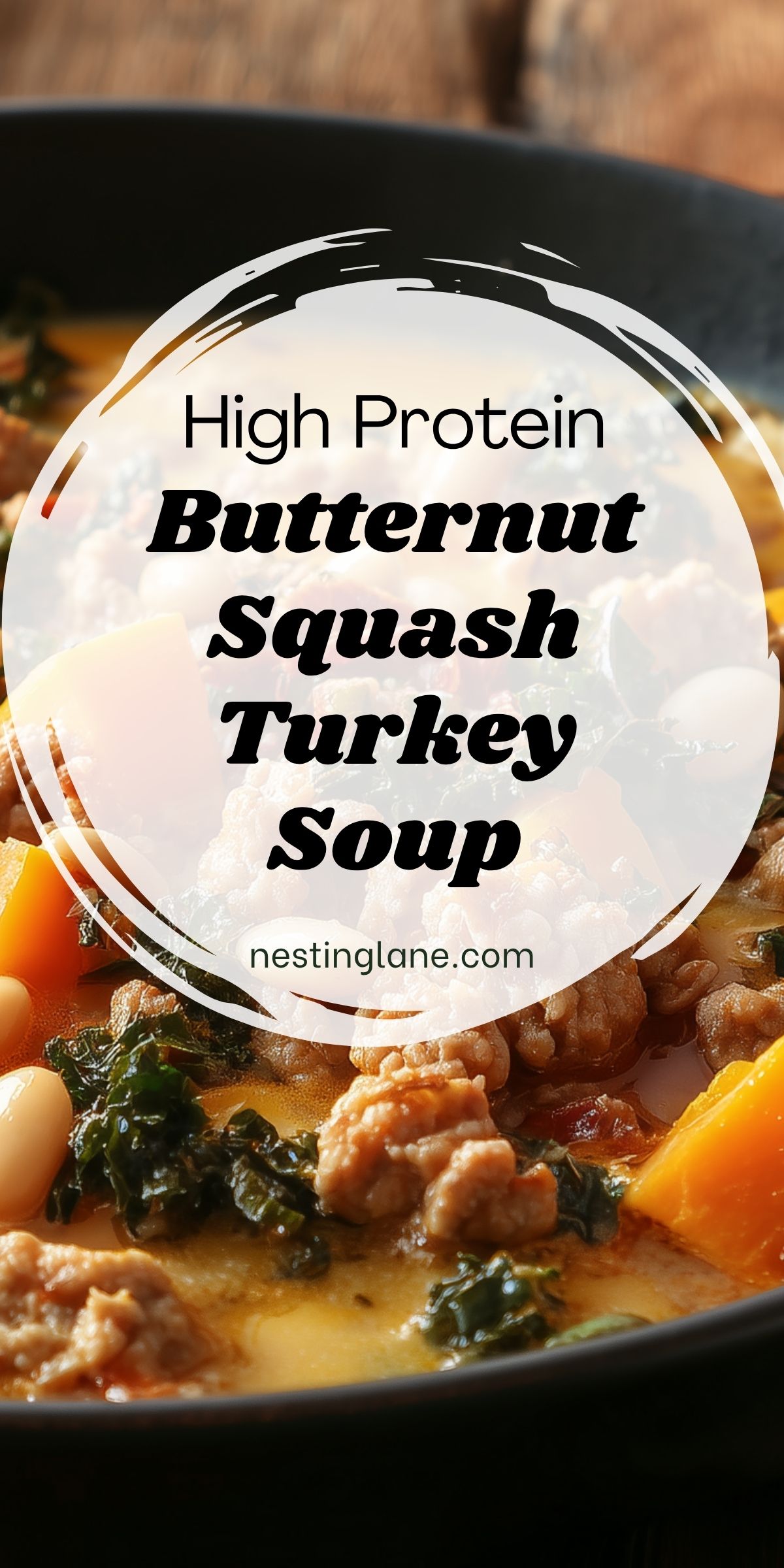 High protein butternut squash turkey soup in a black bowl with ground turkey, squash, kale, and white beans. Text reads “High Protein Butternut Squash Turkey Soup” and “nestinglane.com.”