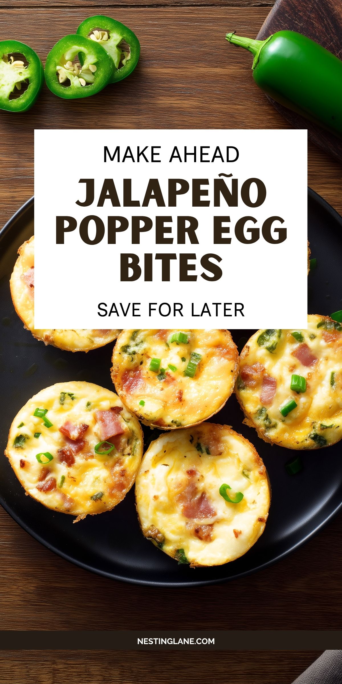 Make-ahead Jalapeño Popper Egg Bites with bacon, cheddar cheese, jalapeños, and green onions on a black plate. Text reads: “MAKE AHEAD JALAPEÑO POPPER EGG BITES SAVE FOR LATER” and “NESTINGLANE.COM.”