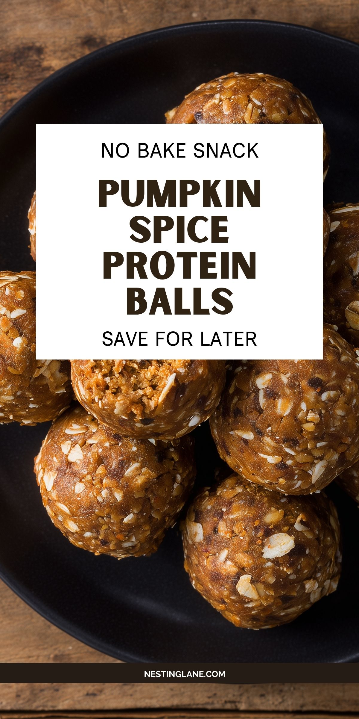 Pumpkin Spice Protein Balls with visible oats on a black plate over a rustic wooden table. Text reads: "NO BAKE SNACK PUMPKIN SPICE PROTEIN BALLS SAVE FOR LATER" and "NESTINGLANE.COM."
